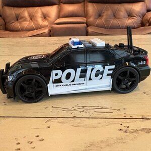 Brooklyn Lollipops - 7.5 Inch Police Car with Siren/Flashing Lights/Wheels Rev